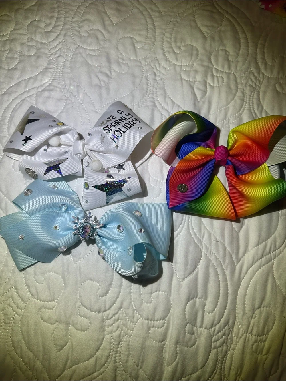 JoJo Siwa White & Rainbow hair bows.  Frozen blue hair bow..